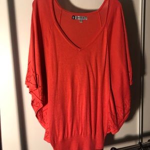 Jennifer Lopez, sweater/ shirt